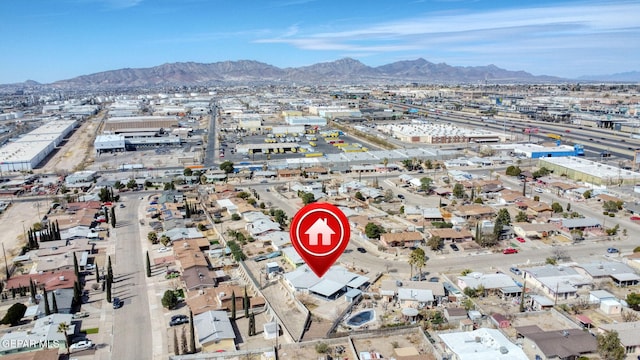 birds eye view of property with a residential view and a mountain view