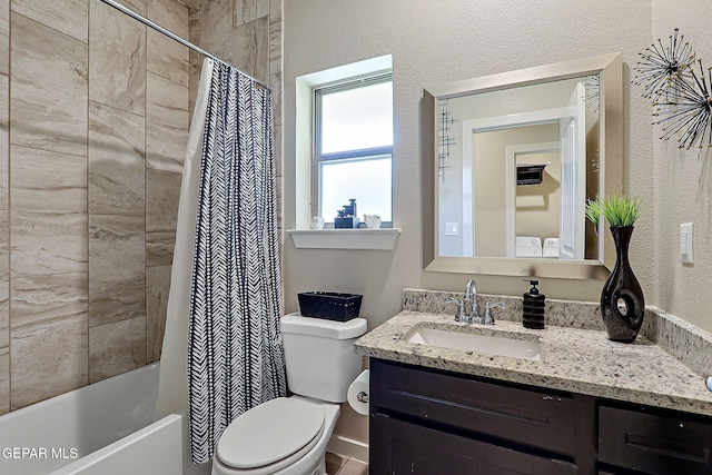 full bathroom featuring vanity, toilet, and shower / bath combo