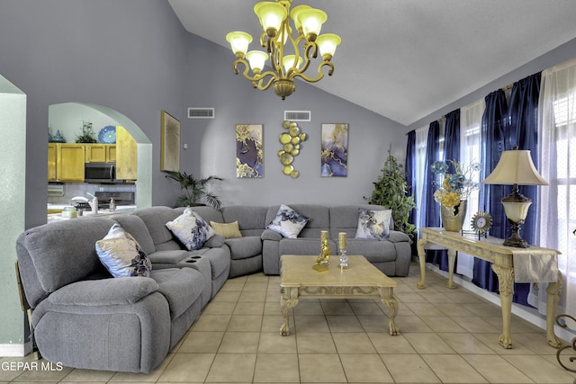 living room featuring a notable chandelier, high vaulted ceiling, and light tile patterned flooring