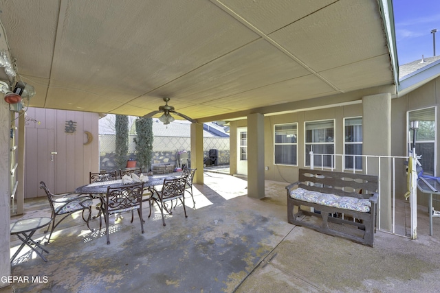 view of patio / terrace featuring ceiling fan