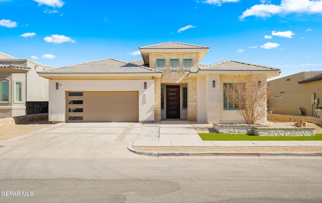 prairie-style home with a garage