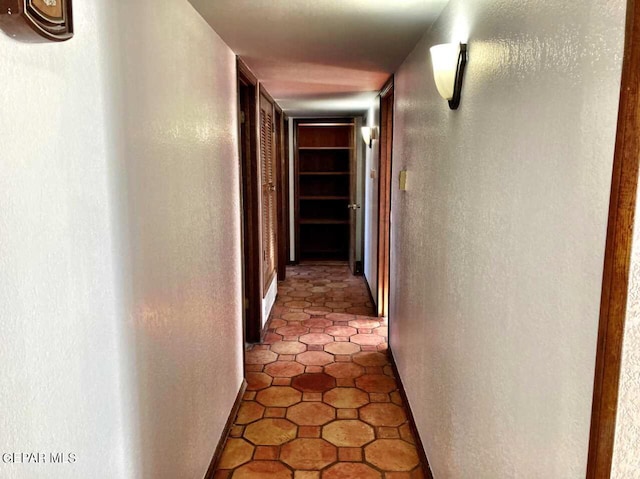 hall featuring tile patterned floors