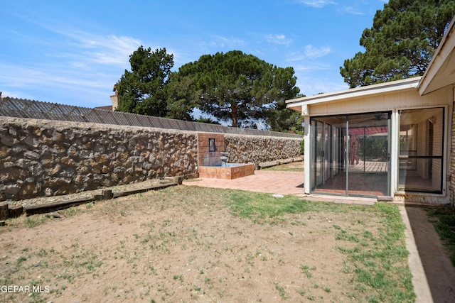 11204 Bob Mitchell Dr, El Paso, TX 79936 - view of yard with a sunroom, a patio, and fence private yard