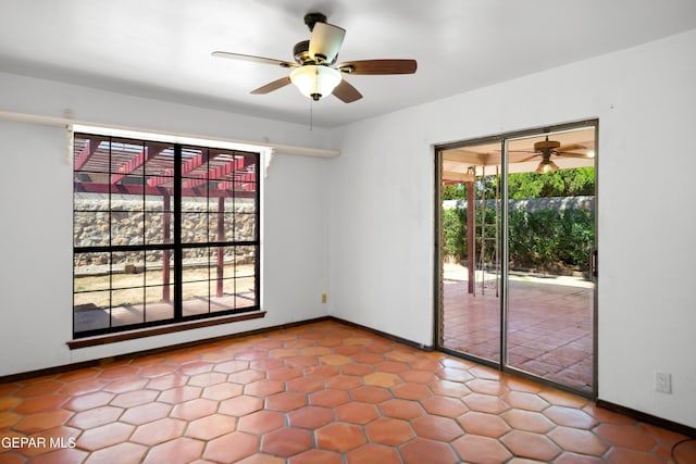 11204 Bob Mitchell Dr, El Paso, TX 79936 - empty room with baseboards and a ceiling fan