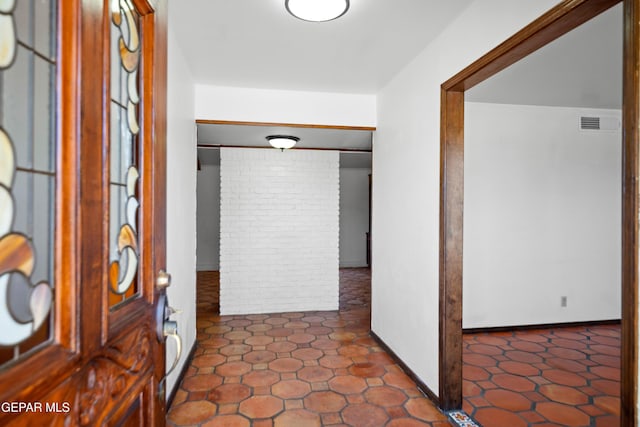 11204 Bob Mitchell Dr, El Paso, TX 79936 - foyer featuring visible vents and baseboards