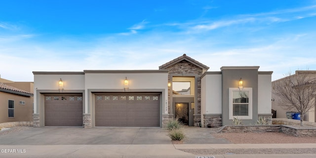 view of front of property with a garage