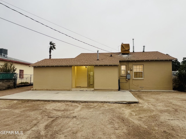 back of property featuring a patio area