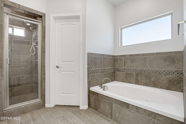 bathroom with independent shower and bath