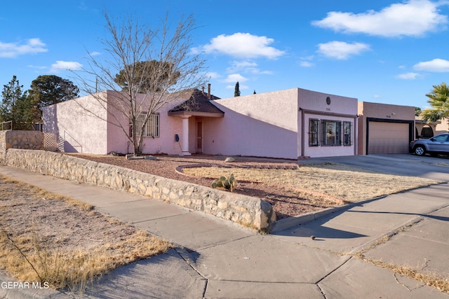 adobe home with a garage