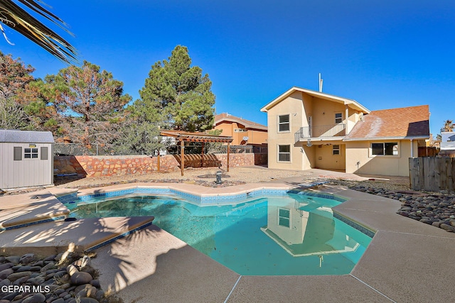 view of pool featuring a storage unit