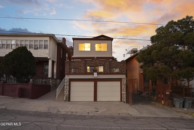 view of front of property with a garage