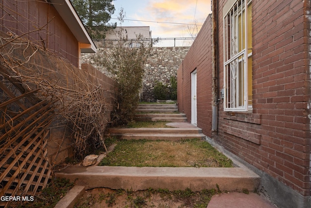 view of property exterior at dusk