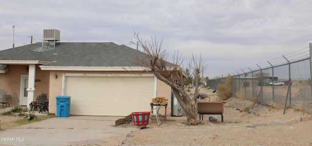 view of home's exterior with a garage