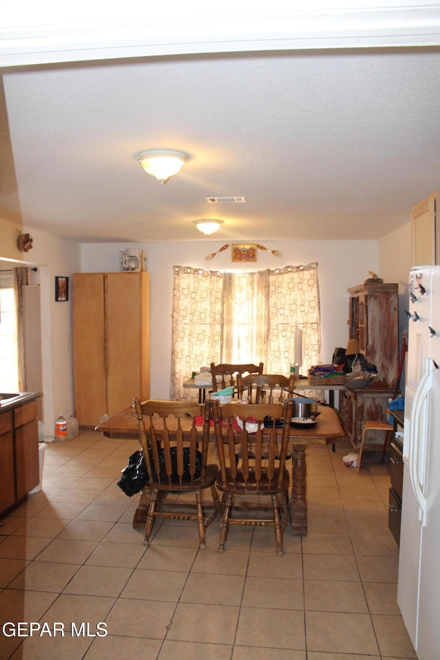 view of tiled dining space