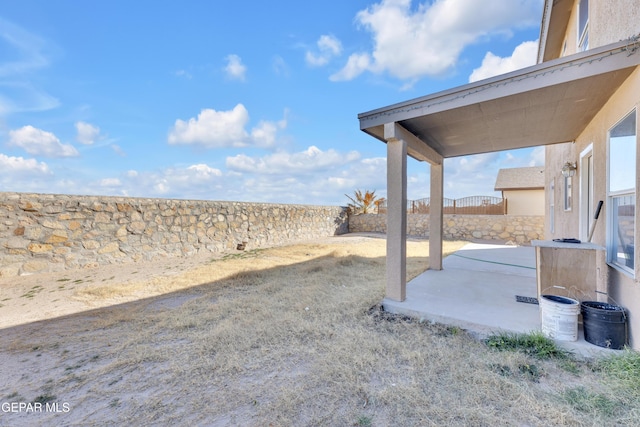 view of yard with a patio area