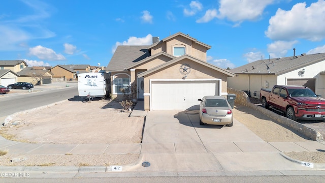 view of front of property with a garage