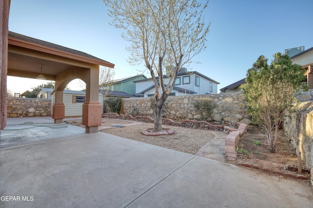 view of patio with a fenced backyard