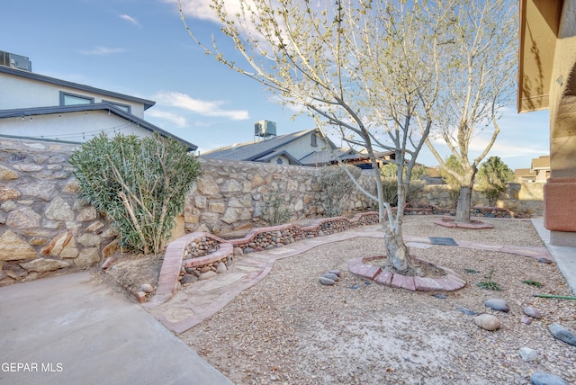 view of yard featuring a fenced backyard and a patio