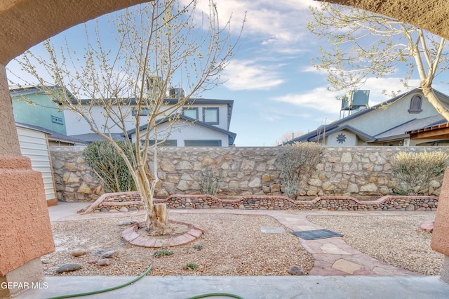 view of yard featuring fence