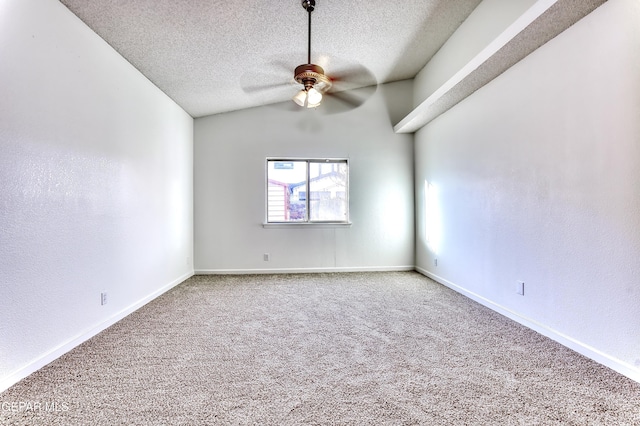 empty room featuring baseboards, carpet, a ceiling fan, and a textured ceiling