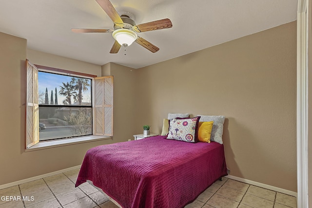 bedroom featuring light tile patterned flooring and ceiling fan