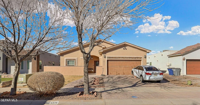 view of front of property featuring a garage