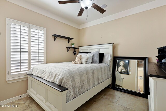 tiled bedroom with ceiling fan