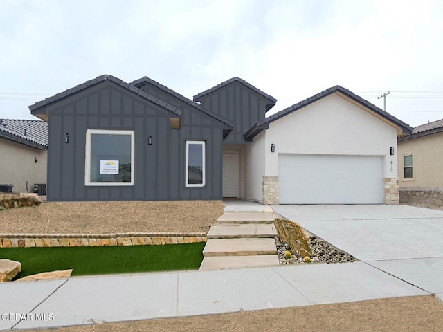 view of front of home with a garage