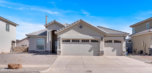 view of front of home with a garage