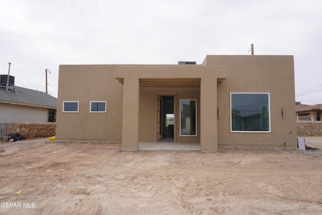 rear view of house with a patio