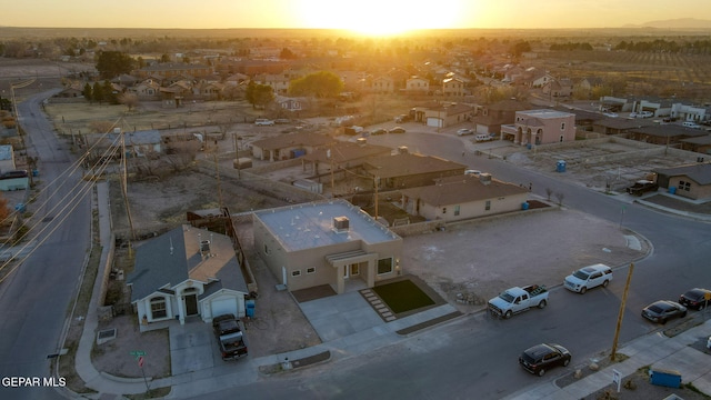 aerial view at dusk with a residential view