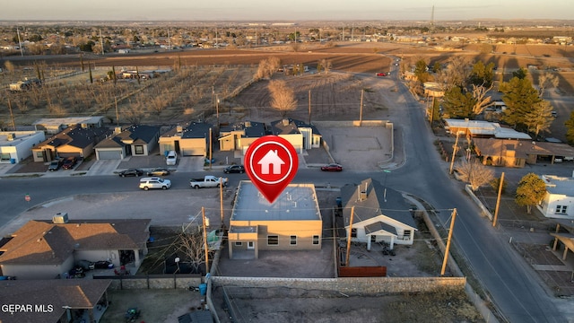 birds eye view of property with a residential view