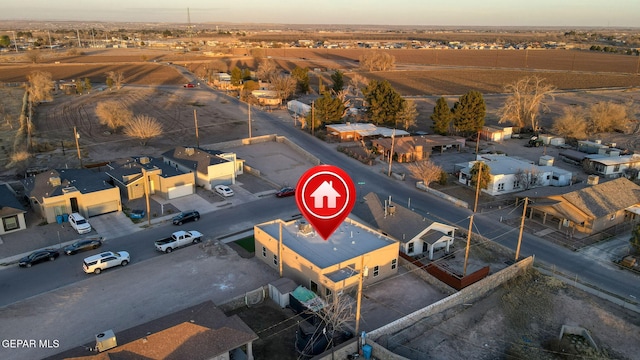 birds eye view of property with a residential view