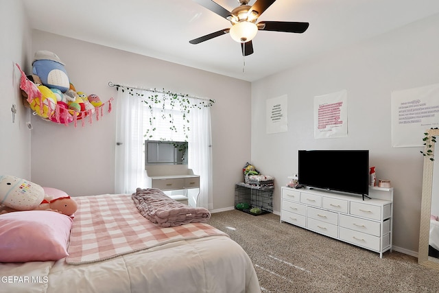 bedroom with carpet, baseboards, and ceiling fan