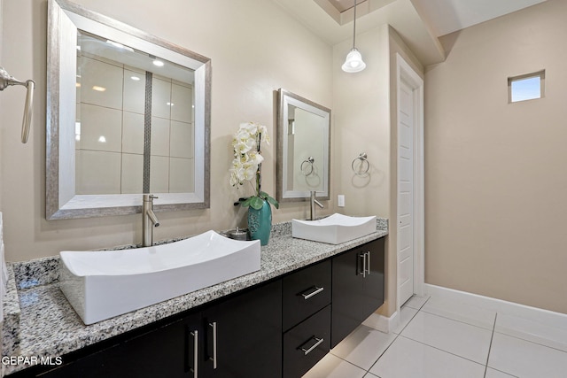 bathroom featuring tile patterned floors and vanity