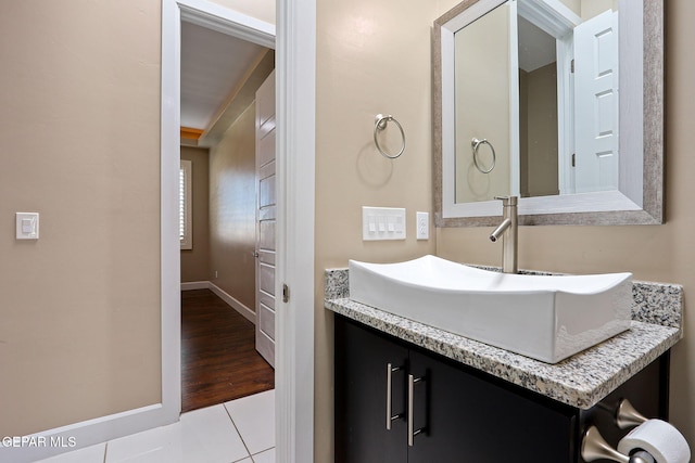 bathroom with vanity and tile patterned floors