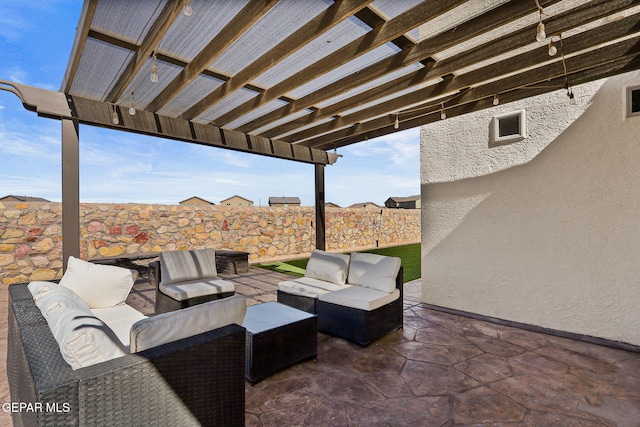 view of patio / terrace featuring an outdoor living space and a pergola