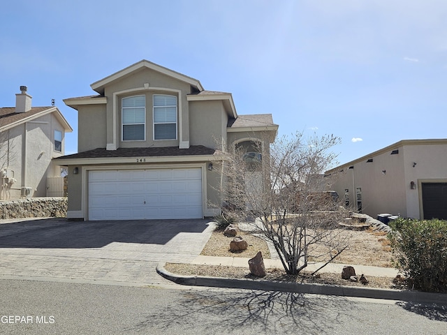 view of front of property featuring a garage