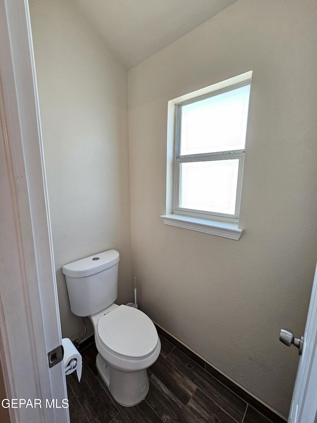 bathroom featuring toilet