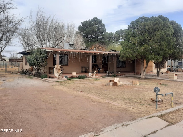 view of front of home with a patio