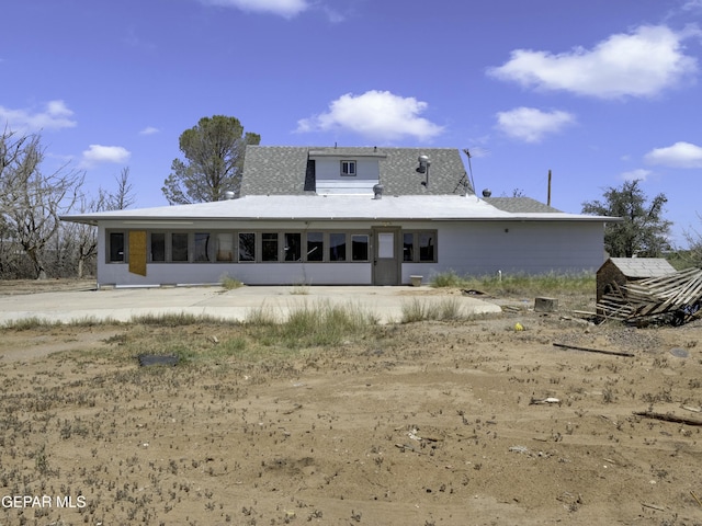 back of house featuring a patio area