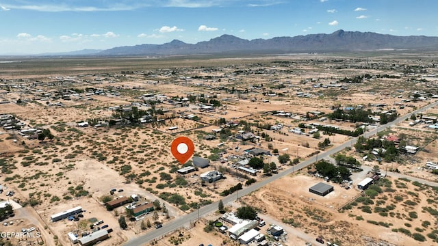 drone / aerial view featuring a mountain view