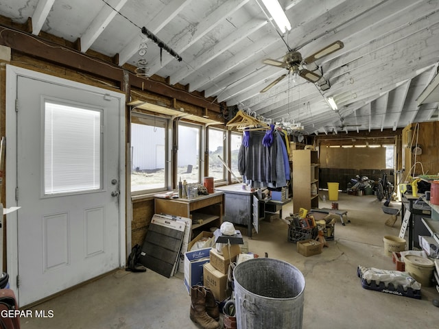 interior space featuring ceiling fan