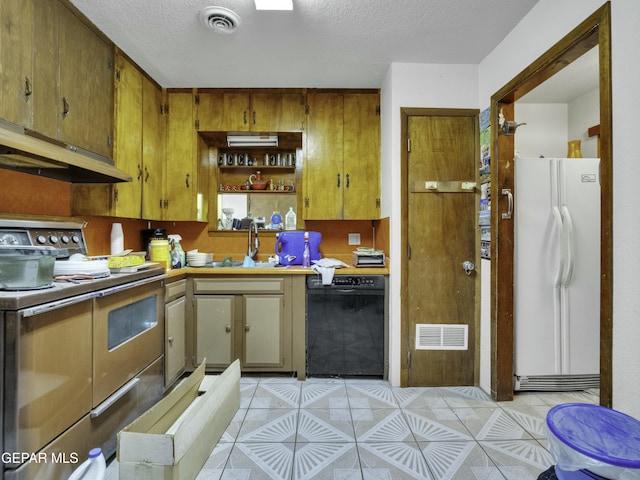 kitchen with sink, range, black dishwasher, white refrigerator, and light tile patterned flooring