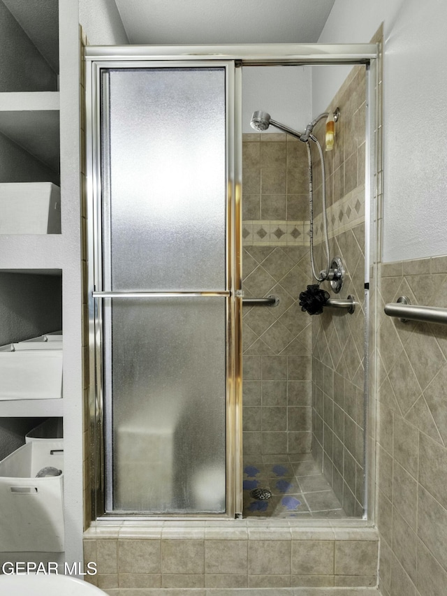 bathroom featuring walk in shower