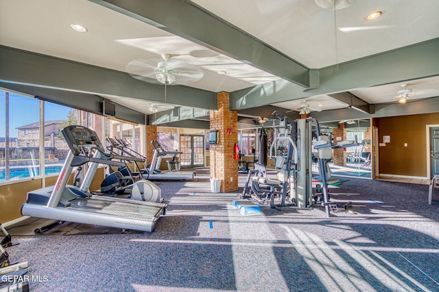 exercise room with ceiling fan