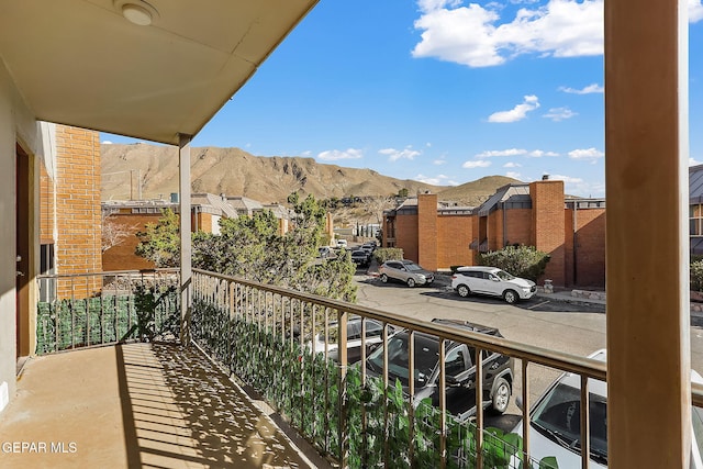 balcony featuring a mountain view