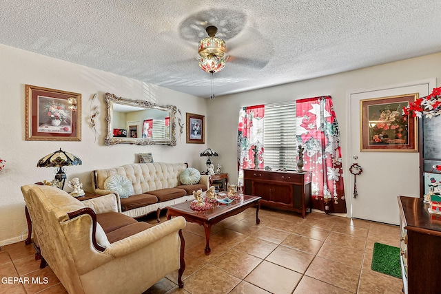 living room with light tile patterned flooring and a textured ceiling