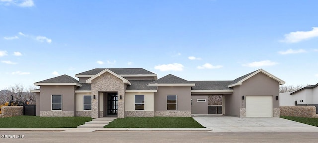 prairie-style house featuring a garage