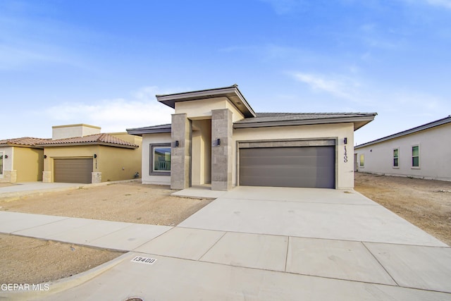 prairie-style house with a garage